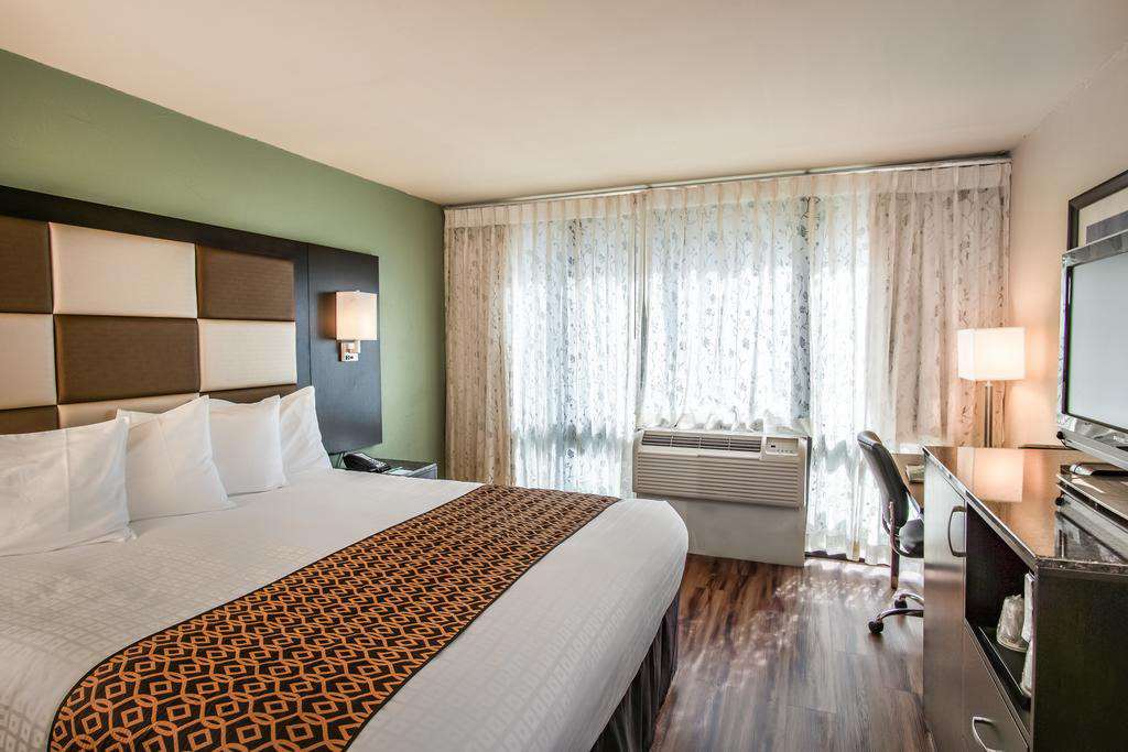 King guest room with warm lighting